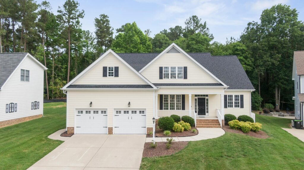 pexels photo 8583907 8583907 A beautiful suburban house with a green lawn and spacious driveway in Wendell, NC.